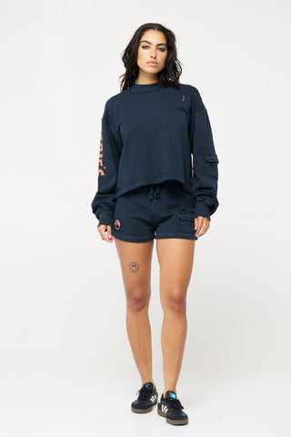Short Shorts in Aries Back Bone Society.