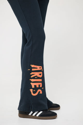 Flared Sweatpants in Aries Back Bone Society.