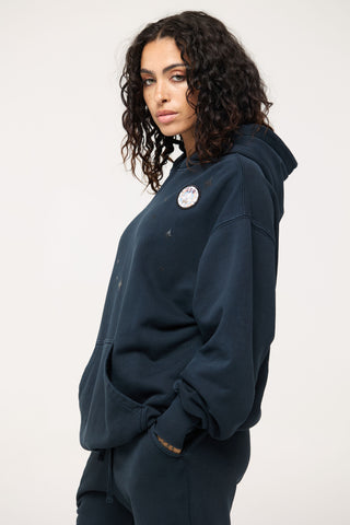 Baggy Hoodie in Leo Back Bone Society.