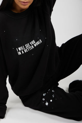 In A Better World Crewneck Back Bone Society.