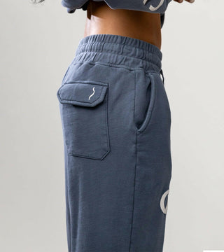 Zodiac Flared Sweatpants in Cancer Back Bone Society.