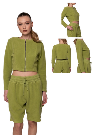 Green jacket and pants set with model and product details on a white background