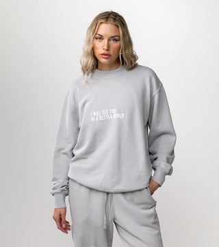 "I will see you in a better world" on front of gray crewneck