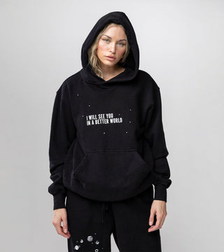 black hoodie with white text reading "I will see you in a better world" on front of hoodie, part of loungewear set