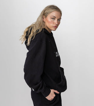 Crafted for comfort and style, the in a better world hoodie in black has white text reading "I Will See You in A Better World", part of a loungewear and streetwear collection