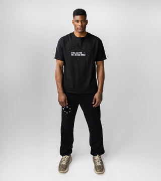 In A Better World set featuring black sweatpants and black tee with galaxy inspired designs