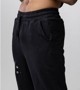 In A Better World black Sweatpants side view